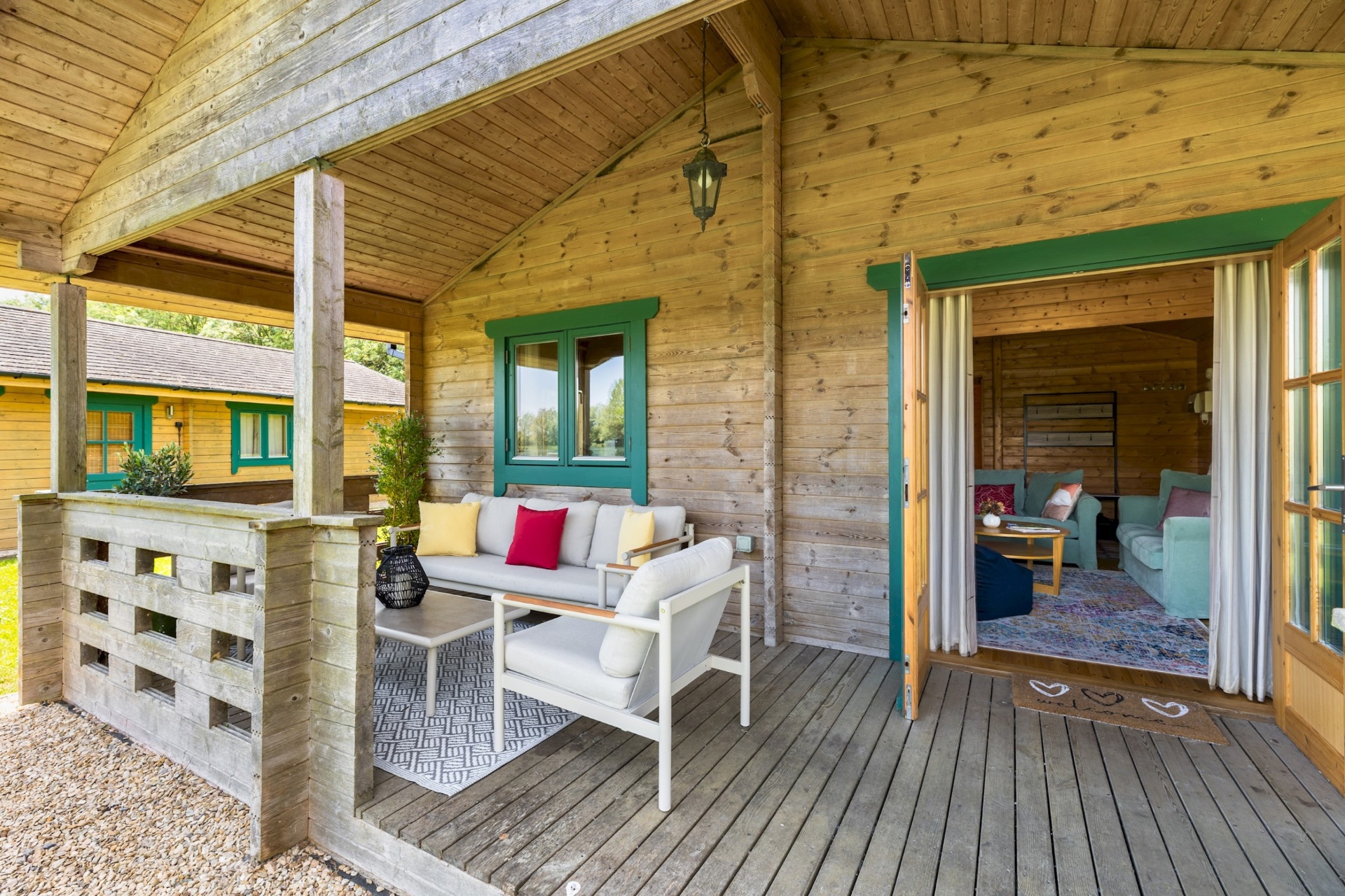 Primrose Lodge veranda with doors open into the lounge